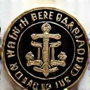 Official seal of 'National Barbers Guild of Canada', featuring classic barber tools.